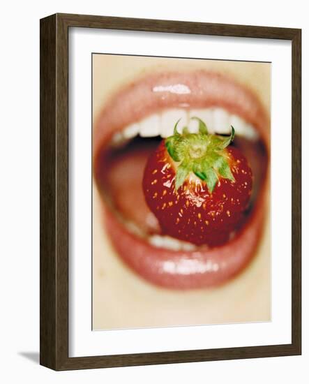 Strawberry Between Teeth-Cristina-Framed Photographic Print