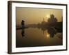 Stray Dog on a Sand Bank of the Yamuna River as the Sun is Seen Rising over the Taj Mahal in India-null-Framed Photographic Print