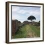 Street and Buildings in the Roman Town of Ostia, 2nd Century-CM Dixon-Framed Photographic Print