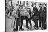 Street Hawker Selling Football Favours in King's Cross, London, 1911 (1926-192)-null-Stretched Canvas