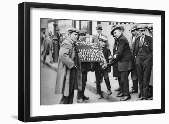 Street Hawker Selling Football Favours in King's Cross, London, 1911 (1926-192)-null-Framed Giclee Print