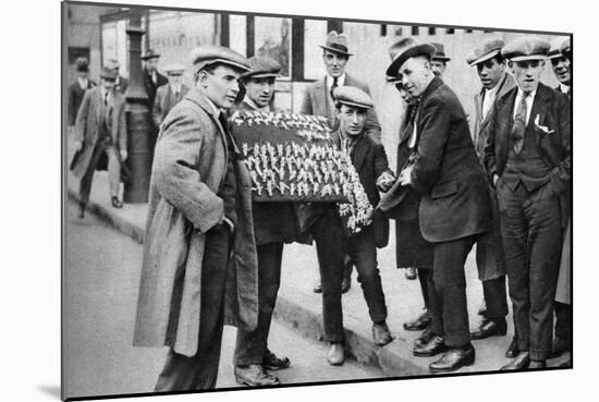 Street Hawker Selling Football Favours in King's Cross, London, 1911 (1926-192)-null-Mounted Giclee Print
