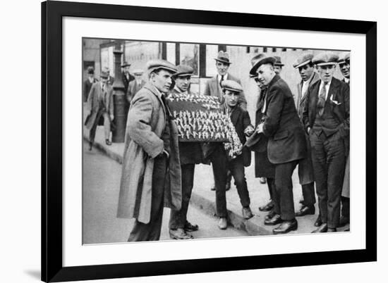 Street Hawker Selling Football Favours in King's Cross, London, 1911 (1926-192)-null-Framed Giclee Print