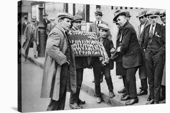 Street Hawker Selling Football Favours in King's Cross, London, 1911 (1926-192)-null-Stretched Canvas