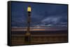 Street lamp against dramatic sky at dusk, Seaside, Oregon, USA-Panoramic Images-Framed Stretched Canvas