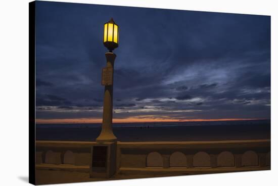 Street lamp against dramatic sky at dusk, Seaside, Oregon, USA-Panoramic Images-Stretched Canvas