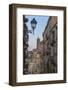 Street lanterns and houses in the typical alleys of the old town, Caltagirone, Province of Catania,-Roberto Moiola-Framed Photographic Print