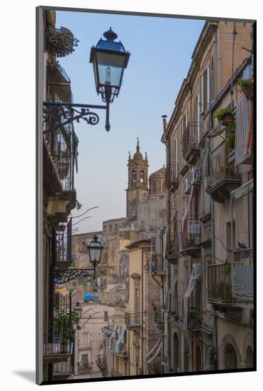 Street lanterns and houses in the typical alleys of the old town, Caltagirone, Province of Catania,-Roberto Moiola-Mounted Photographic Print