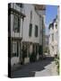 Street Lined with Hollyhocks, St. Martin-De-Re, Ile De Re Charente-Maritime, France, Europe-Peter Richardson-Stretched Canvas