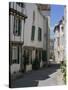 Street Lined with Hollyhocks, St. Martin-De-Re, Ile De Re Charente-Maritime, France, Europe-Peter Richardson-Stretched Canvas