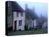 Street of "Gold Hill" Shrouded in Fog, Shaftesbury, Dorset, England-Jan Stromme-Stretched Canvas