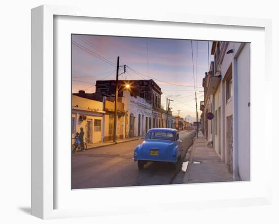 Street Scene at Twilight with Classic Blue American Car, Cienfuegos-Lee Frost-Framed Photographic Print