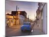 Street Scene at Twilight with Classic Blue American Car, Cienfuegos-Lee Frost-Mounted Photographic Print