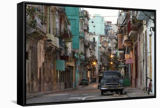 Street Scene before Sunrise - Dilapidated Buildings Crowded Together and Vintage American Cars-Lee Frost-Framed Stretched Canvas