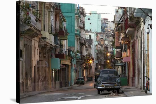 Street Scene before Sunrise - Dilapidated Buildings Crowded Together and Vintage American Cars-Lee Frost-Stretched Canvas