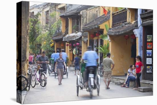 Street Scene, Hoi An, Quang Nam, Vietnam, Indochina, Southeast Asia, Asia-Ian Trower-Stretched Canvas