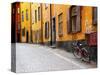 Street Scene in Gamla Stan Section with Bicycle and Mailbox, Stockholm, Sweden-Nancy & Steve Ross-Stretched Canvas