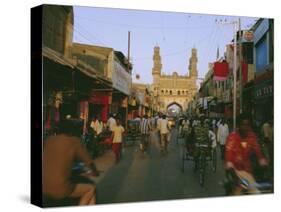 Street Scene with Bicycles and Rickshaw and the Char Minar Triumphal Arch Built in 1591, India-John Henry Claude Wilson-Stretched Canvas