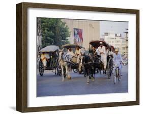 Street Scene with Horse Drawn Carriages, Rawalpindi, Punjab, Pakistan-David Poole-Framed Photographic Print