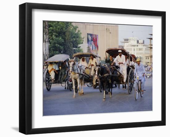 Street Scene with Horse Drawn Carriages, Rawalpindi, Punjab, Pakistan-David Poole-Framed Photographic Print