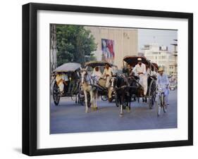 Street Scene with Horse Drawn Carriages, Rawalpindi, Punjab, Pakistan-David Poole-Framed Photographic Print