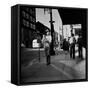 Street Scene with Village Atmosphere, Man Carrying Baby-Walker Evans-Framed Stretched Canvas