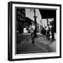 Street Scene with Village Atmosphere, Man Carrying Baby-Walker Evans-Framed Photographic Print