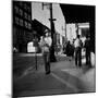 Street Scene with Village Atmosphere, Man Carrying Baby-Walker Evans-Mounted Photographic Print