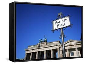 Street Sign and Brandenburg Gate, Berlin, Germany-Hans Peter Merten-Framed Stretched Canvas