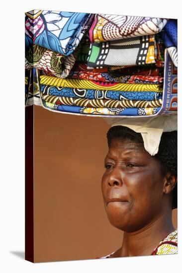 Street vendor selling African cloths, Lome, Togo-Godong-Stretched Canvas