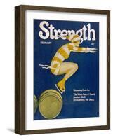 Strength: Girl Ice Skating over Barrels-W.n. Clyment-Framed Photographic Print