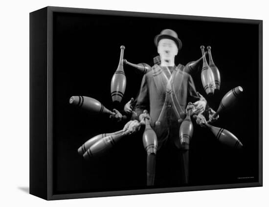 Stroboscopic Image of Juggler Stan Cavenaugh Juggling Tenpins-Gjon Mili-Framed Stretched Canvas