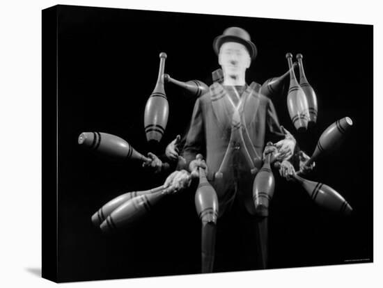 Stroboscopic Image of Juggler Stan Cavenaugh Juggling Tenpins-Gjon Mili-Stretched Canvas