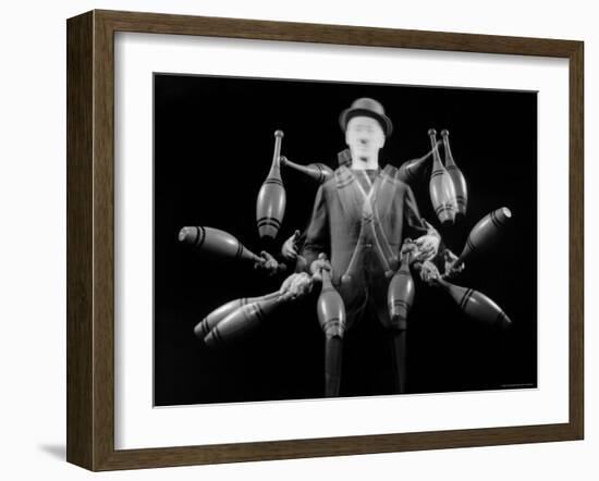 Stroboscopic Image of Juggler Stan Cavenaugh Juggling Tenpins-Gjon Mili-Framed Photographic Print