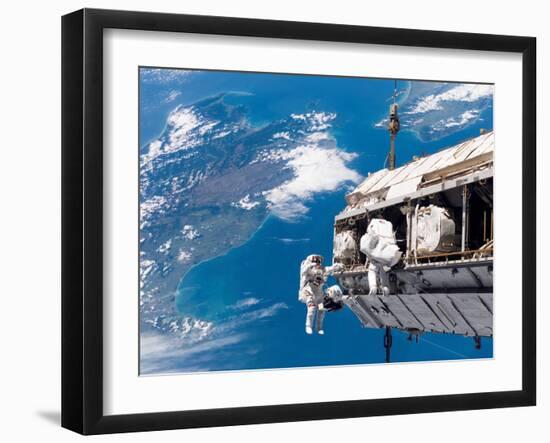 STS-116 Mission Specialists Participate in the First of the Three Mission's Extravehicular Activity-Stocktrek Images-Framed Photographic Print