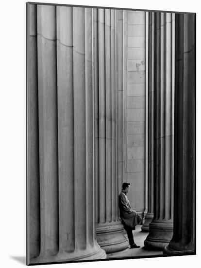 Student Leaning Against Ionic Columns at Entrance of Main Building at MIT-Gjon Mili-Mounted Photographic Print