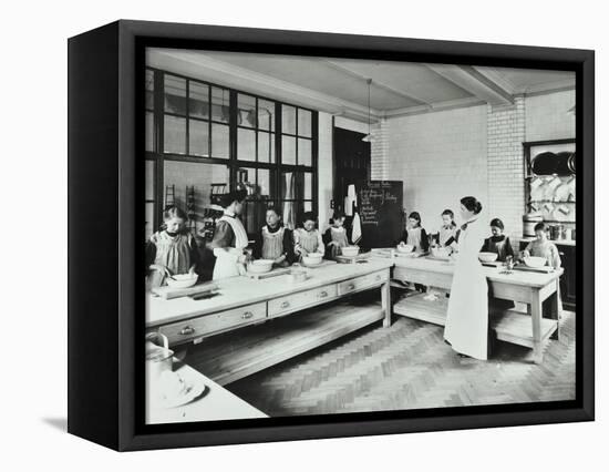 Student Teacher in a Cookery Lesson, Battersea Polytechnic, London, 1907-null-Framed Stretched Canvas