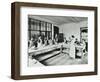 Student Teacher in a Cookery Lesson, Battersea Polytechnic, London, 1907-null-Framed Photographic Print