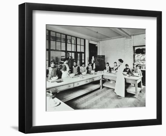 Student Teacher in a Cookery Lesson, Battersea Polytechnic, London, 1907-null-Framed Photographic Print