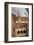 Student Waving Flag from Top of Building-null-Framed Photographic Print