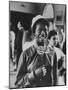 Student Wearing Hat and Button on Shirt That Says: All I Want is Love on "Old Clothes Day"-Gordon Parks-Mounted Premium Photographic Print