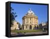 Student With Bicycle in Front of Radcliffe Camera and All Souls College, Oxford University, England-Peter Barritt-Framed Stretched Canvas