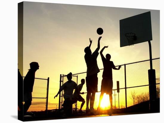 Students Play a Basketball Game as the Sun Sets at Bucks County Community College-null-Stretched Canvas