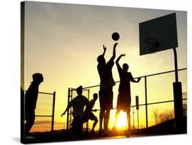 Students Play a Basketball Game as the Sun Sets at Bucks County Community College-null-Stretched Canvas