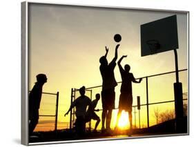 Students Play a Basketball Game as the Sun Sets at Bucks County Community College-null-Framed Photographic Print