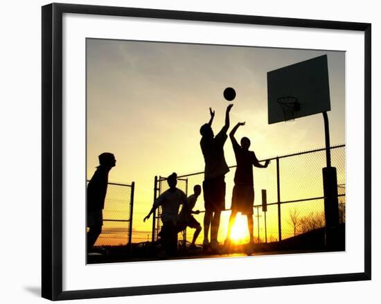 Students Play a Basketball Game as the Sun Sets at Bucks County Community College-null-Framed Photographic Print