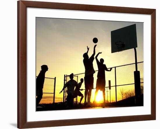 Students Play a Basketball Game as the Sun Sets at Bucks County Community College-null-Framed Photographic Print