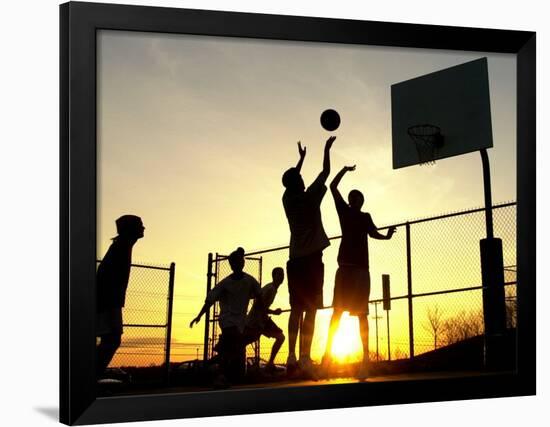 Students Play a Basketball Game as the Sun Sets at Bucks County Community College-null-Framed Photographic Print