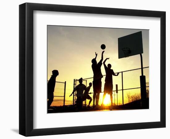 Students Play a Basketball Game as the Sun Sets at Bucks County Community College-null-Framed Photographic Print