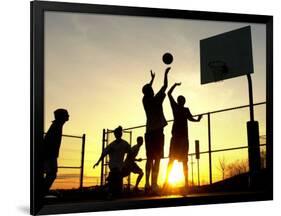 Students Play a Basketball Game as the Sun Sets at Bucks County Community College-null-Framed Photographic Print